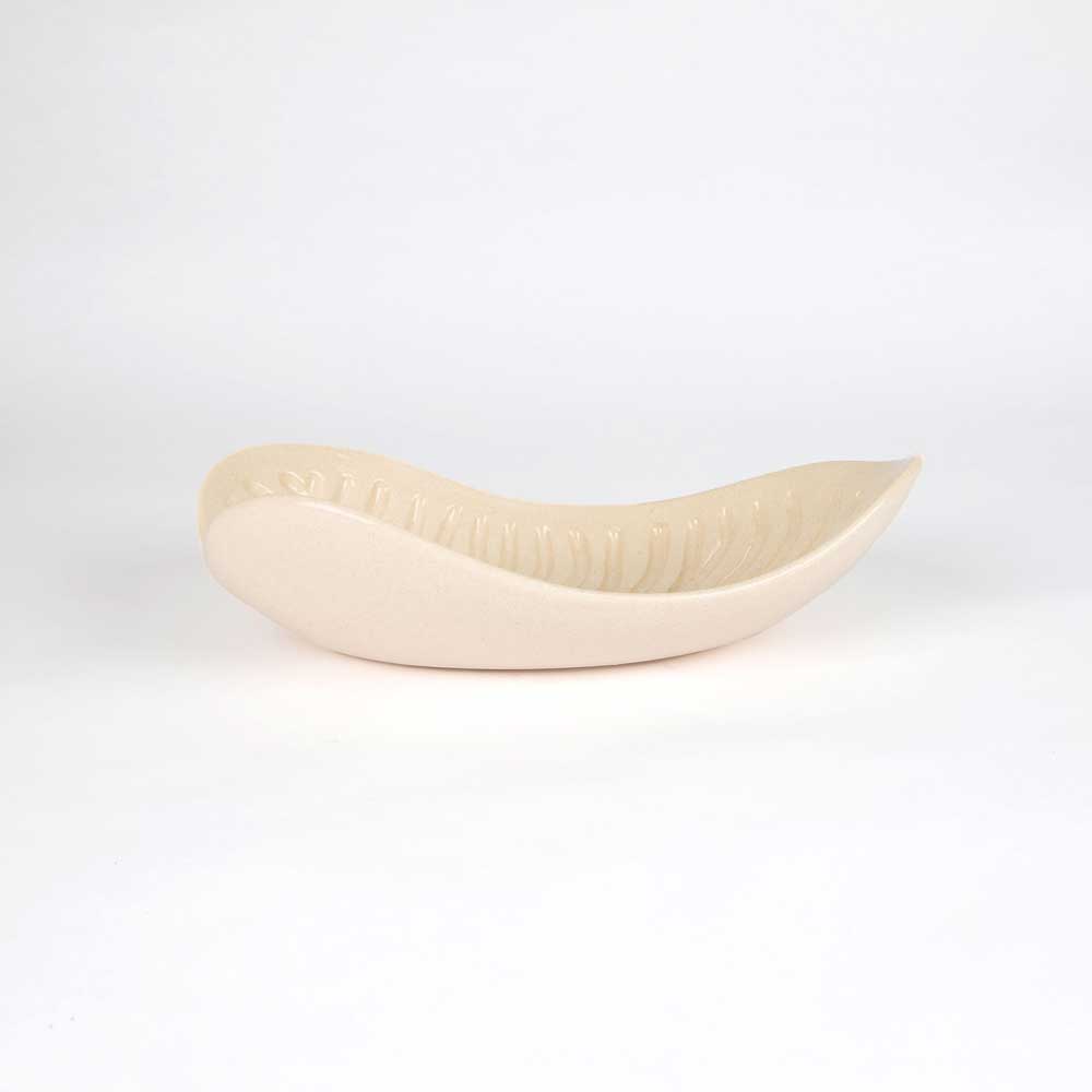 Medium organic shaped Sooty Welsh bowl on white background