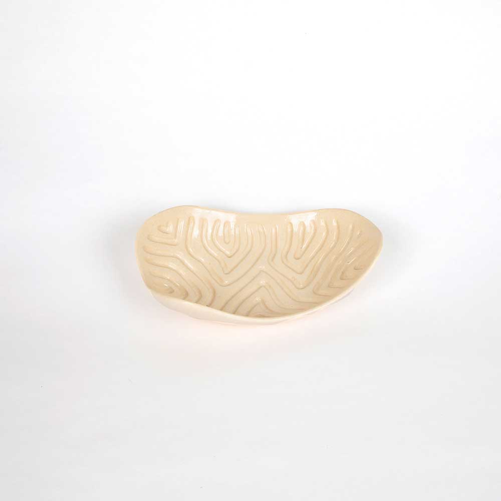 Medium organic shaped Sooty Welsh bowl on white background