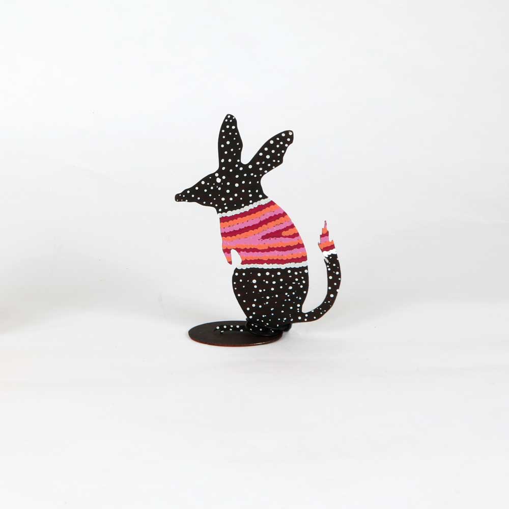 metal bilby in black and white, with stripes on white background