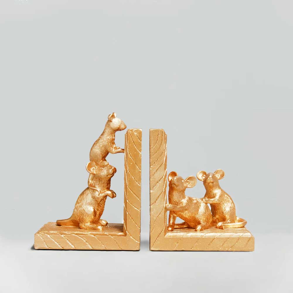  gold mice resin bookends. photographed on white background for Australian Museum Shop online