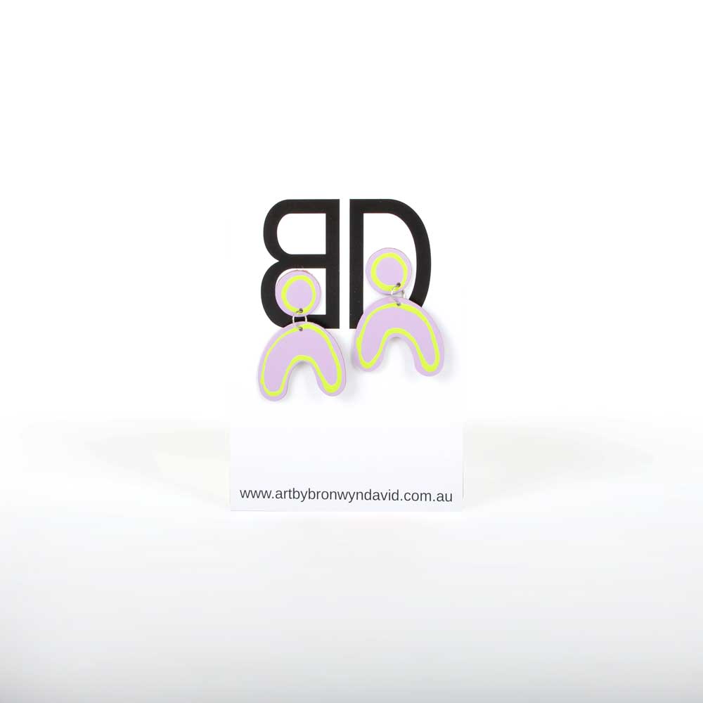 Bronwyn David cut hand painted leather Earrings with surgical steel hooks on white background