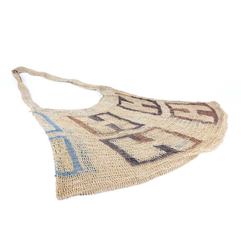 Large natural Bilum Bag from the sepik River region of Papua New Guinea, on white background