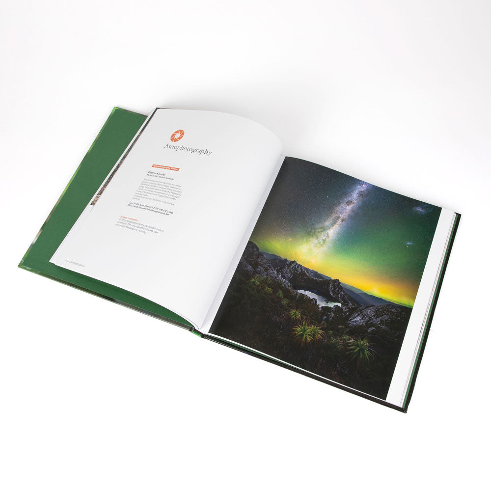 Nature photographer of the year Catalogue Book open on internal pages, on white background