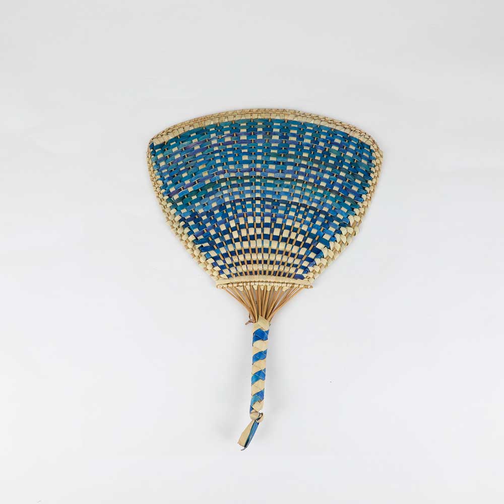 Handwoven fan from Vanuatu on white background