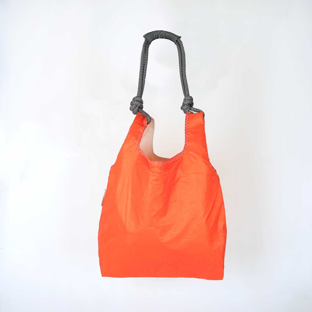 Orange  seashopper sailcloth bag on white background for Australian Museum Shop online