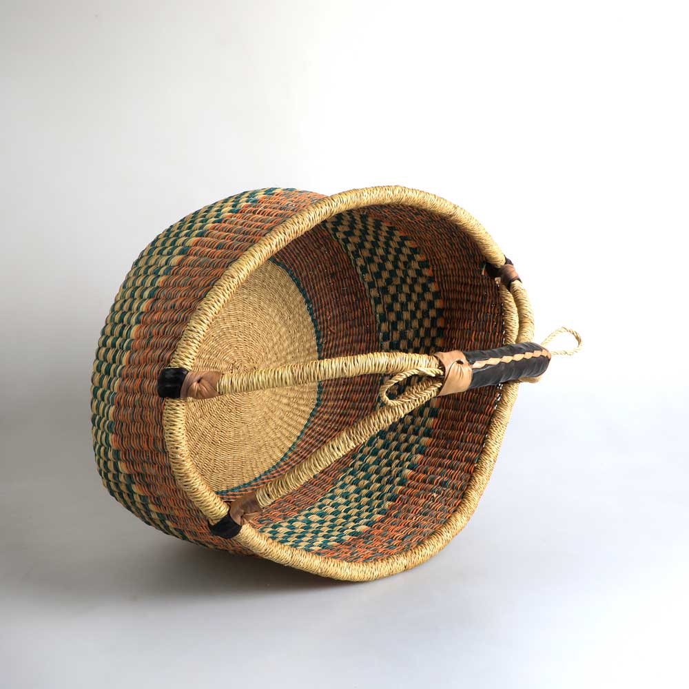 Ghanaian handwoven large round basket photographed on white background. Australian Museum Shop online