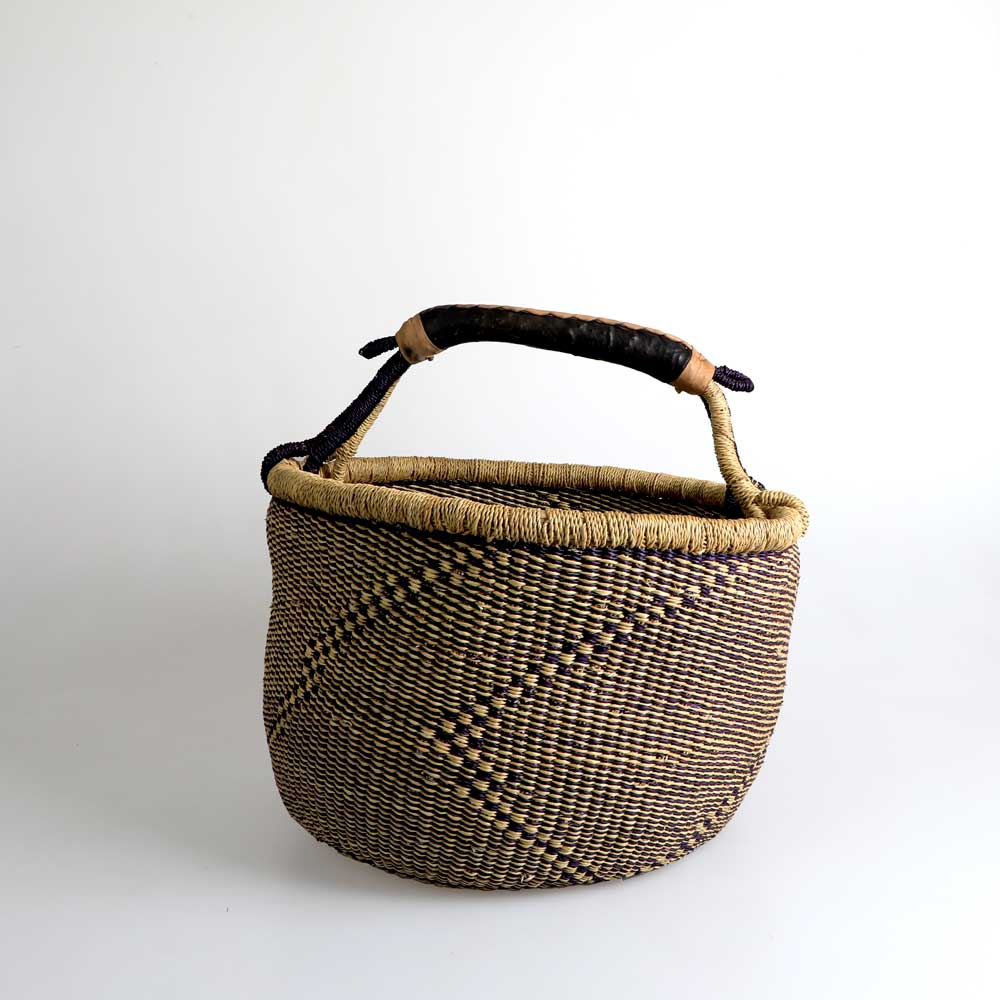 Ghanaian handwoven large round basket photographed on white background. Australian Museum Shop online