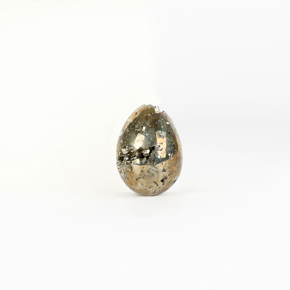 Egg shaped Pyrite crystal on a white background