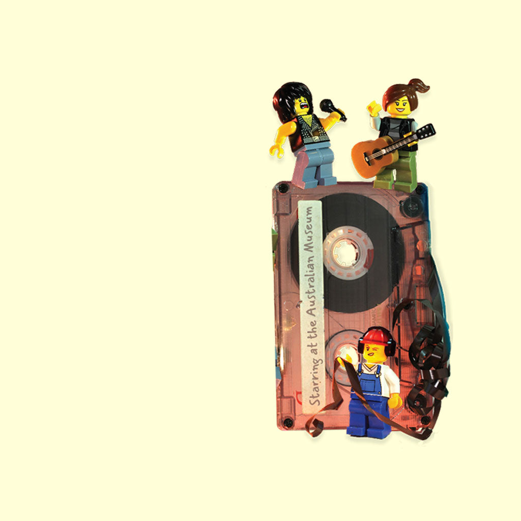 Relics Exhibition minifigs and cassette tape on cream background