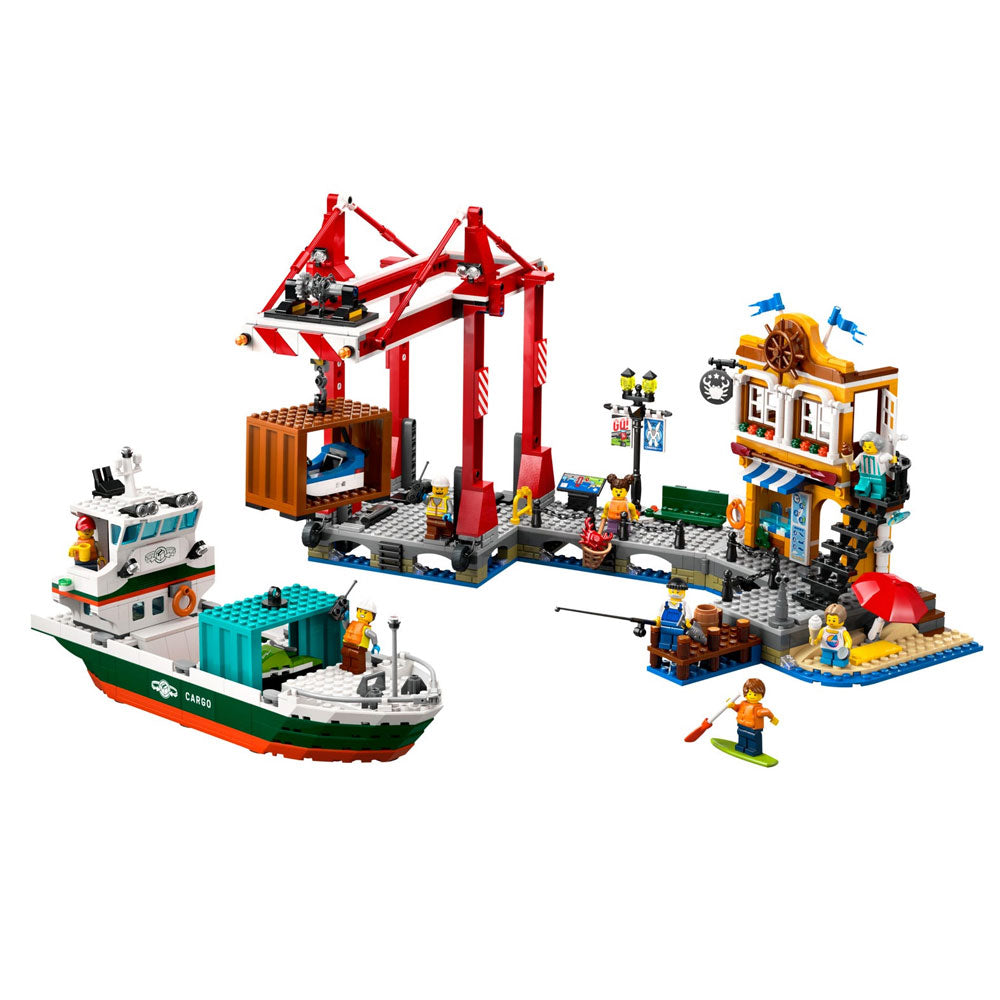 LEGO SEaside Harbour set with a boat, crane, and town scene on a white background