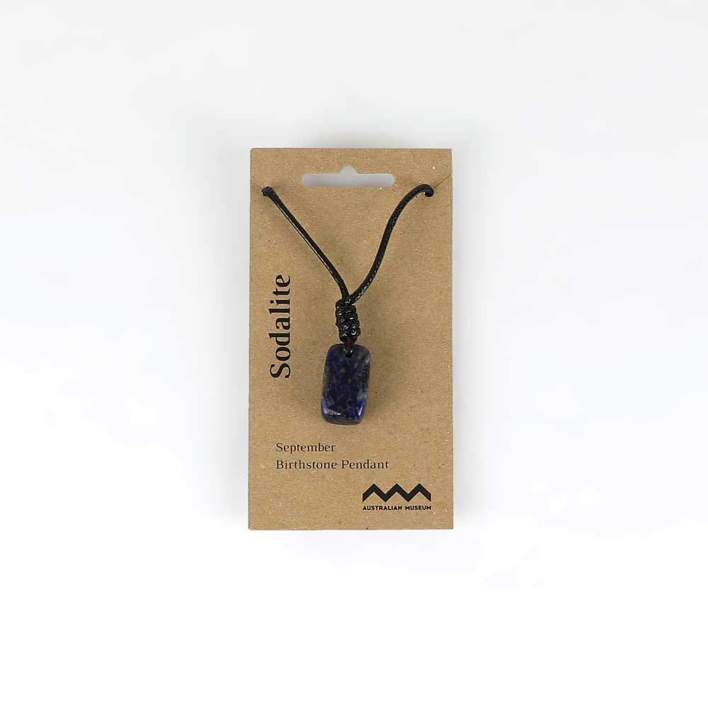 September birthstone pendant on leather and fibre necklace on white background for Australian Museum Shop online