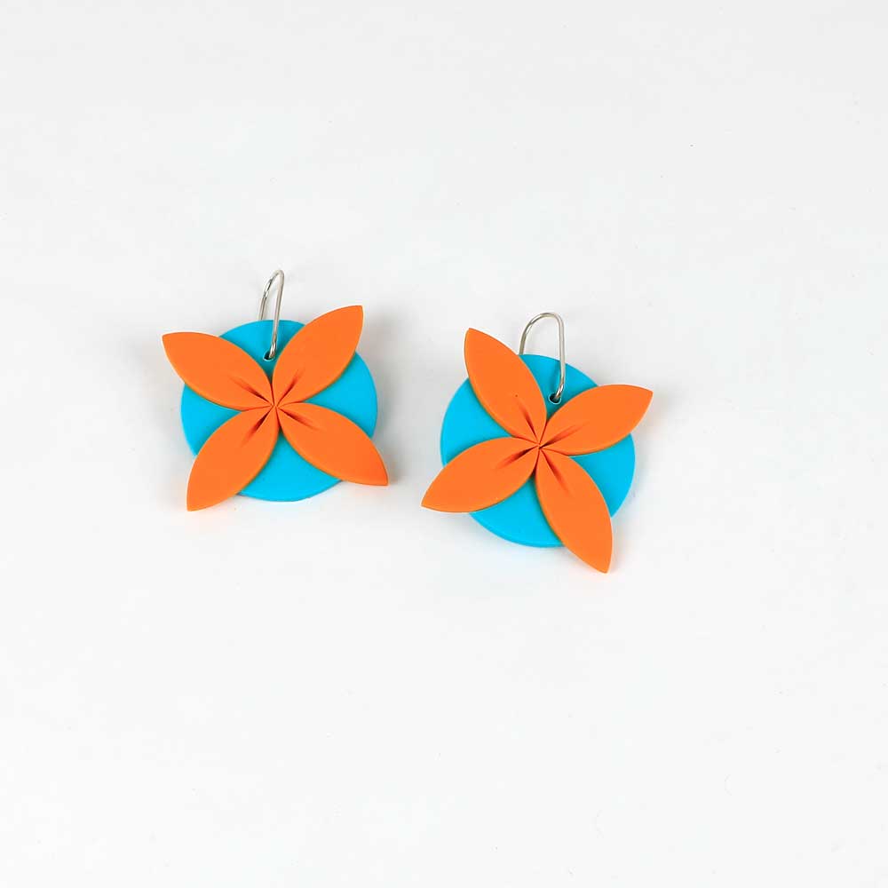 Tipani earrings on white background