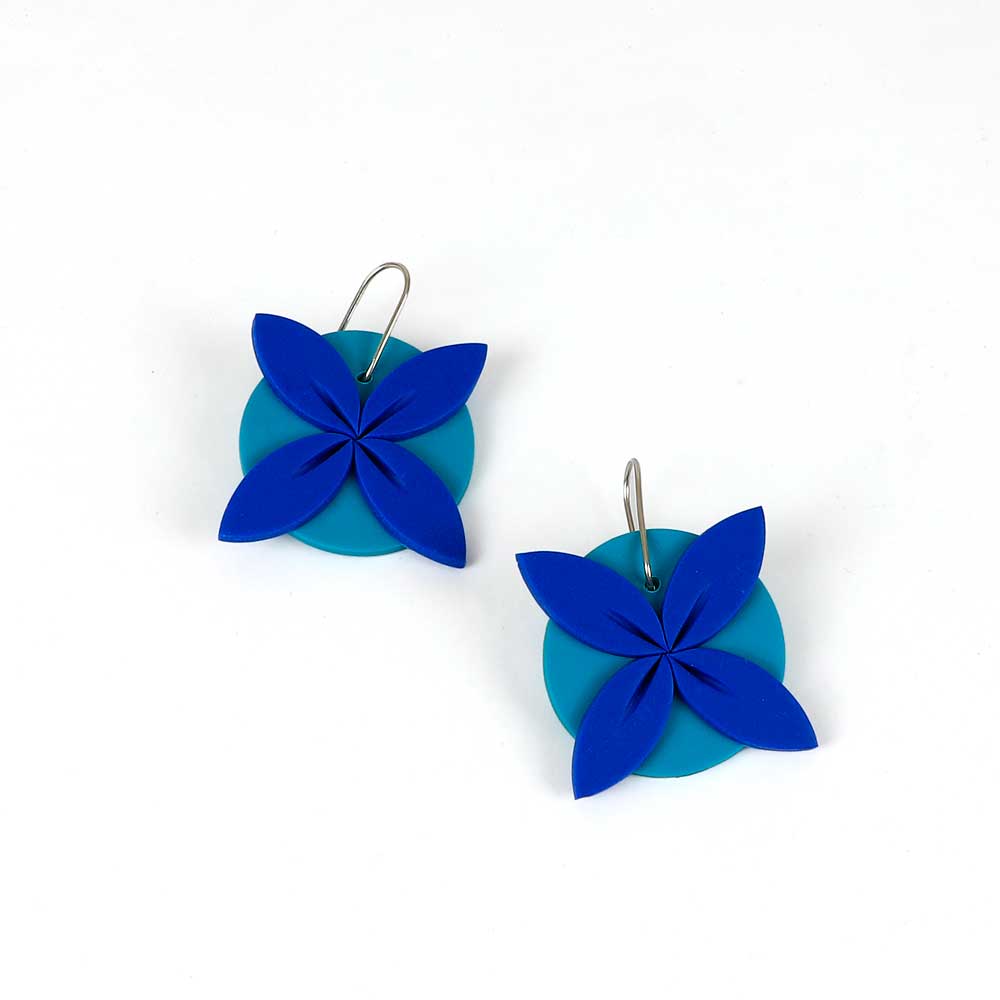 Tipani earrings on white background