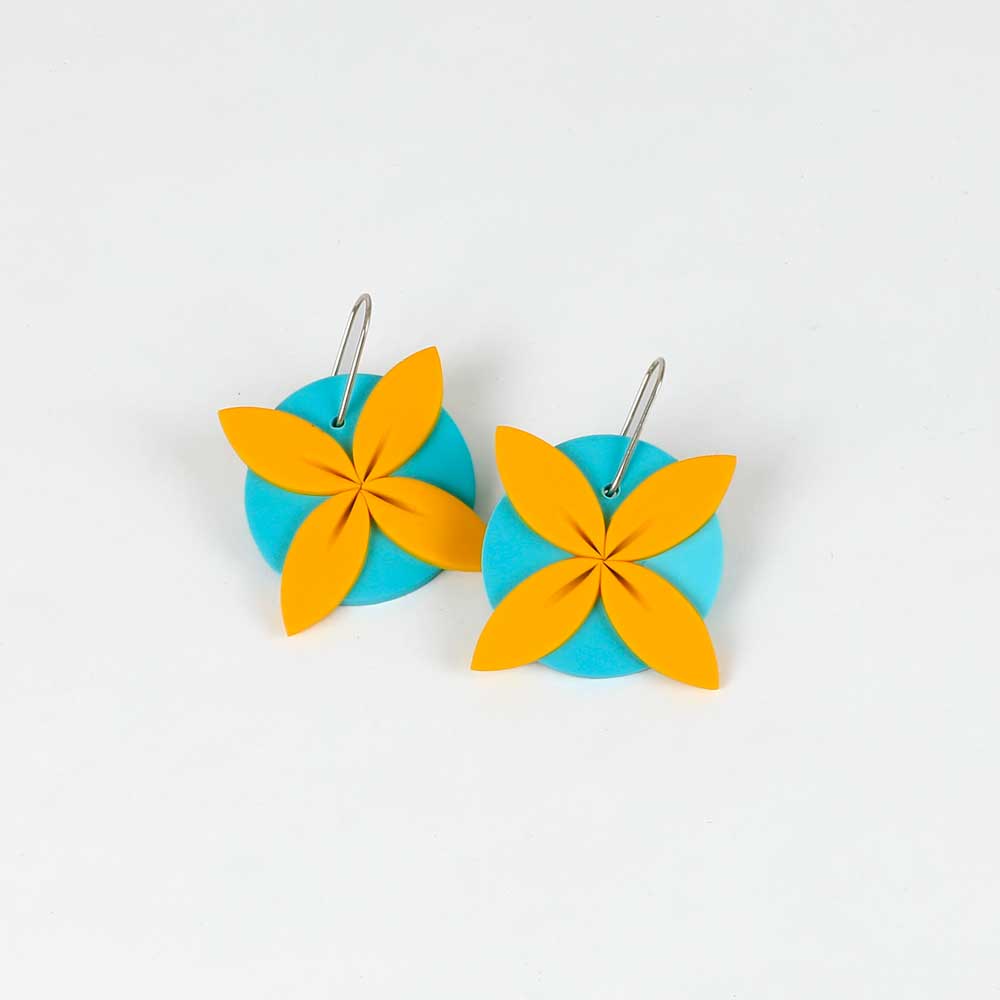 Tipani earrings on white background