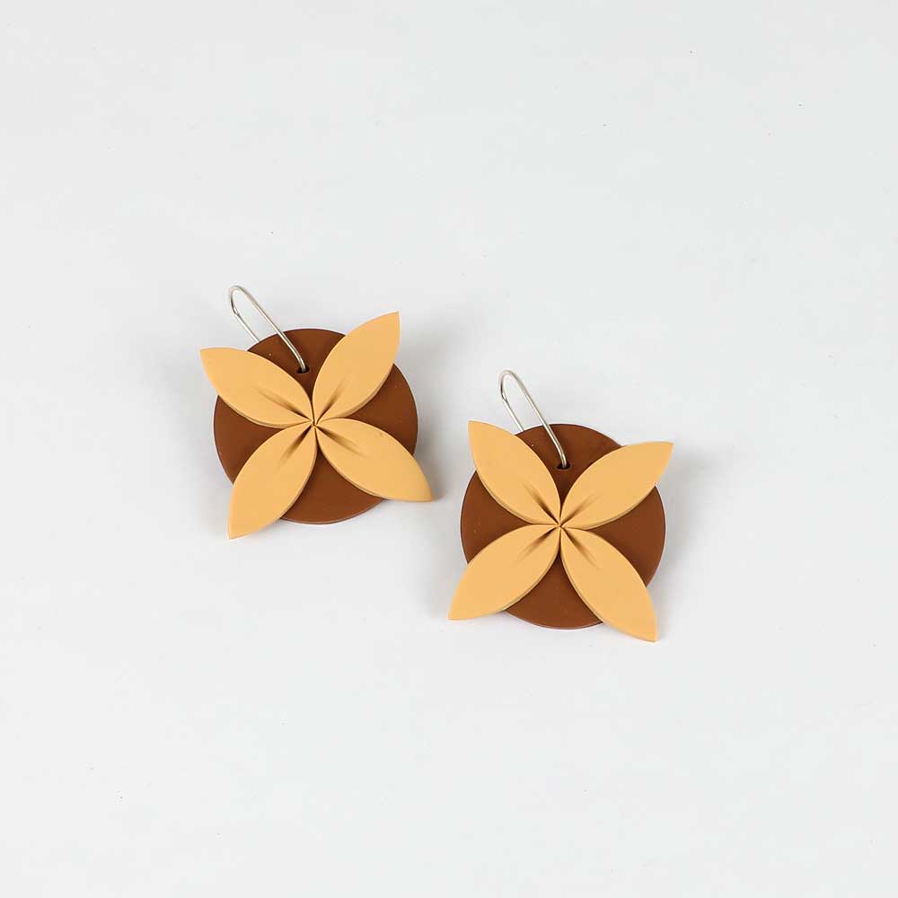 Tipani earrings on white background