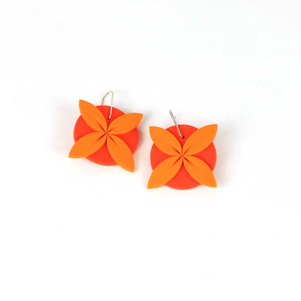 Tipani earrings on white background