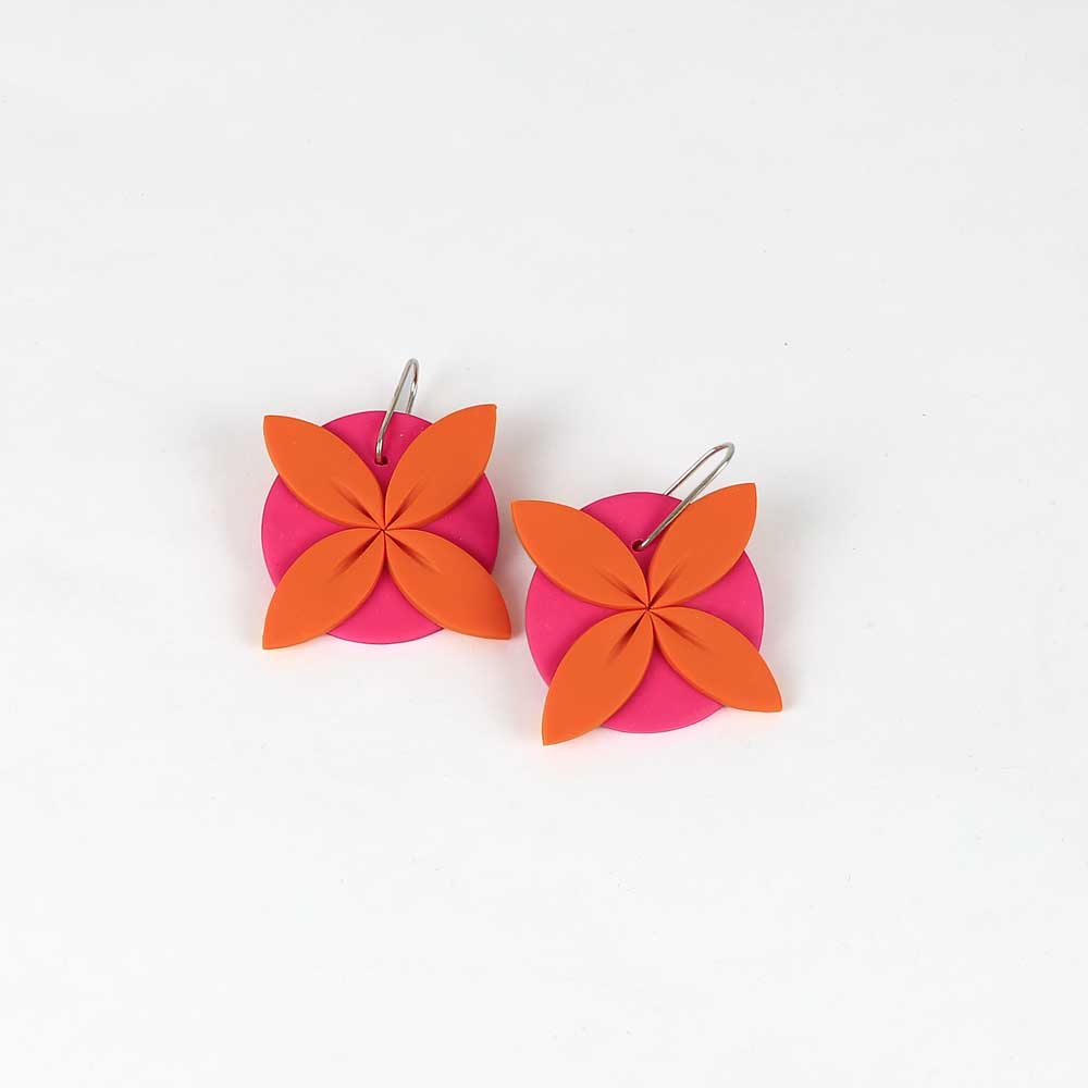 Tipani earrings on white background