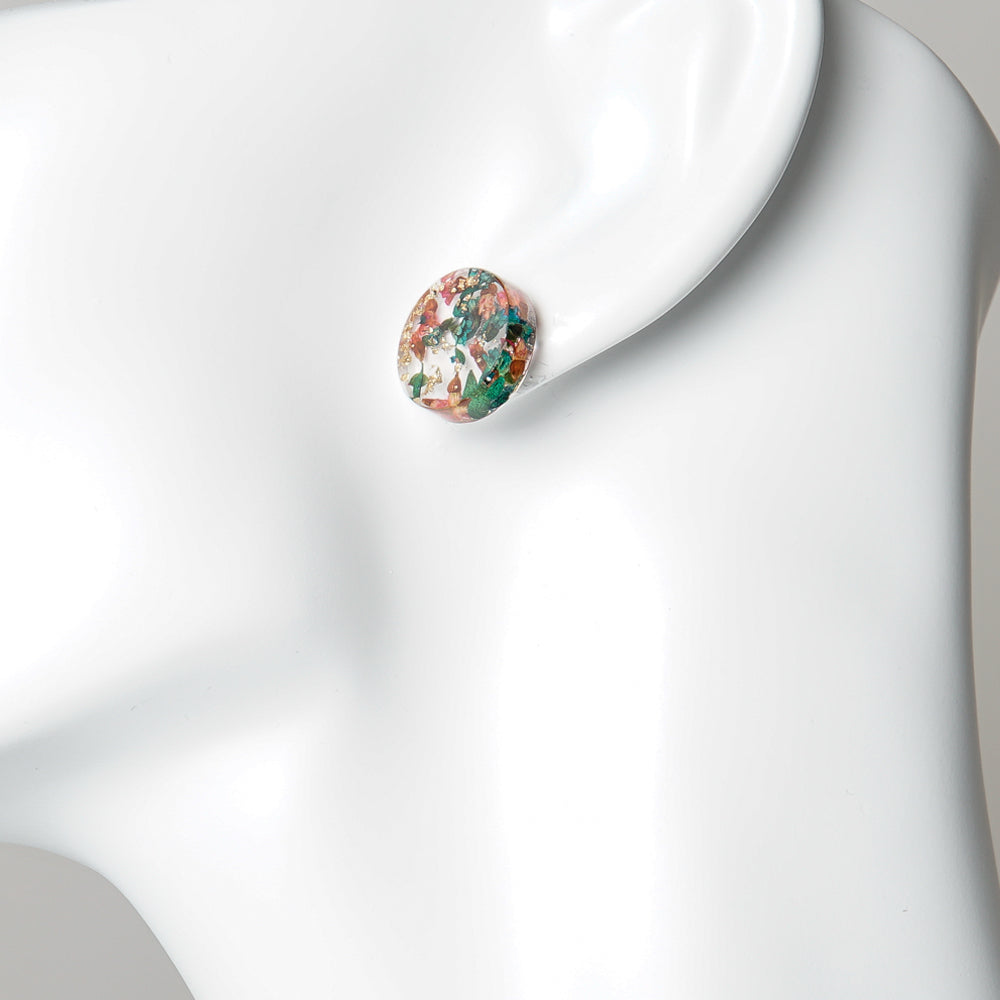 Button stud earrings. Thryptomene in clear acrylic resin. photographed on white background for Australian Museum Shop online