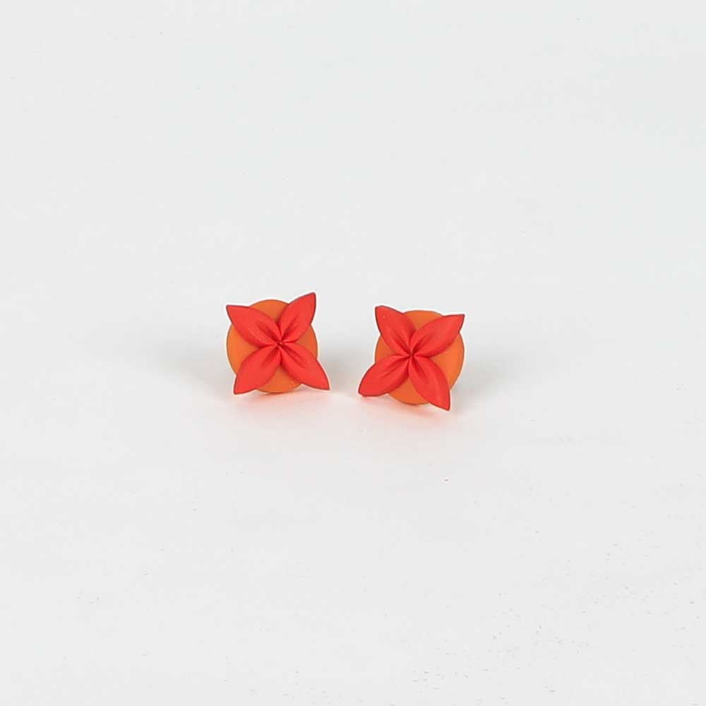 Tipani stud earrings orange papaya on white background