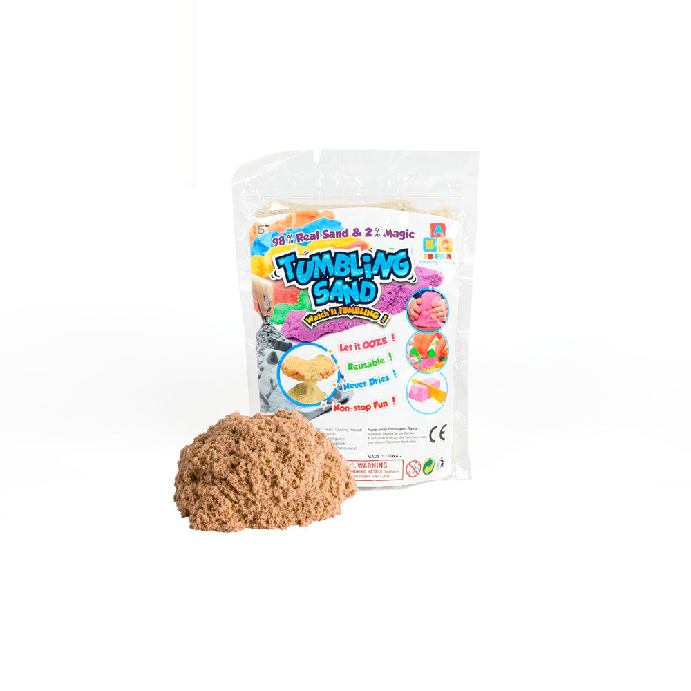 Tumbling Kinetic Sand on white background
