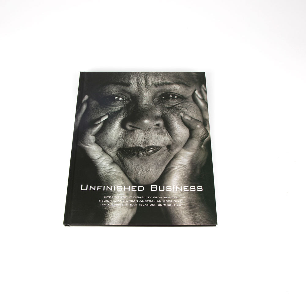 Book titled 'Unfinished Business' on white background
