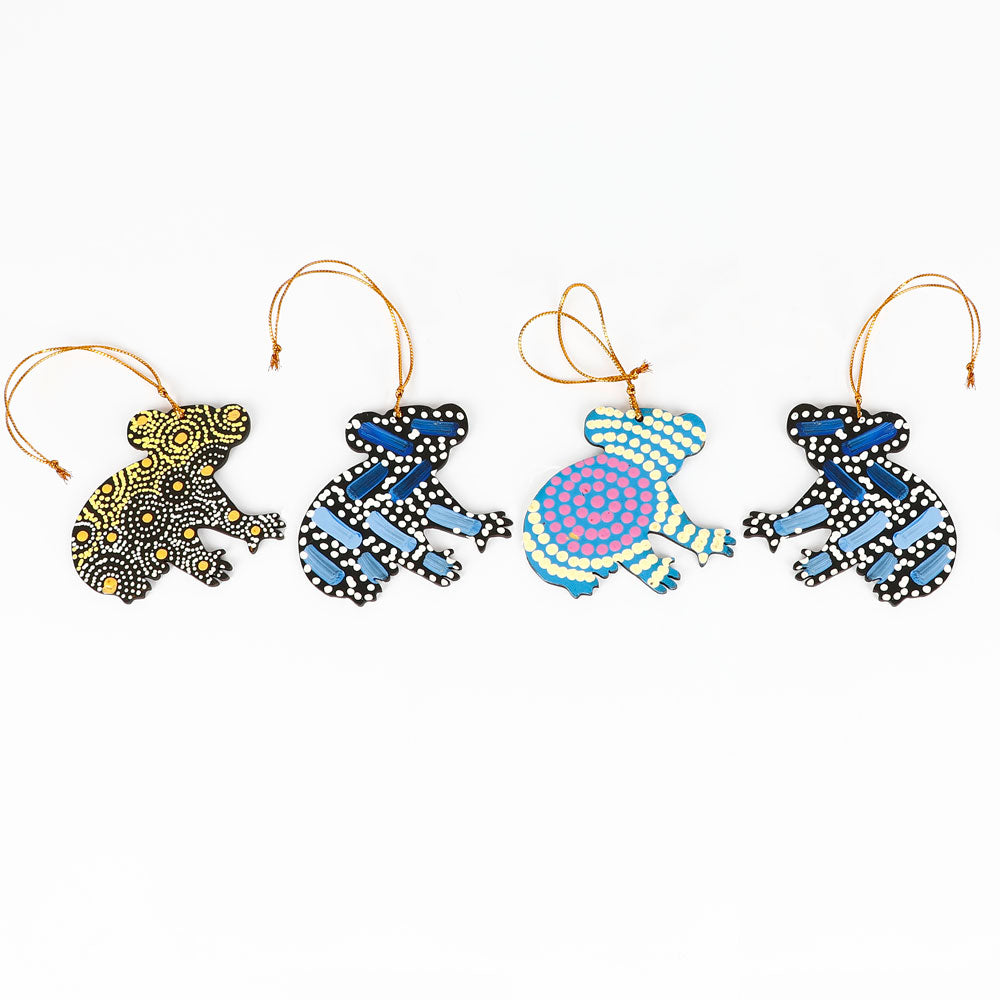 Koala hand painted ornaments from Warlukurlangu Artists Cooperation on white background