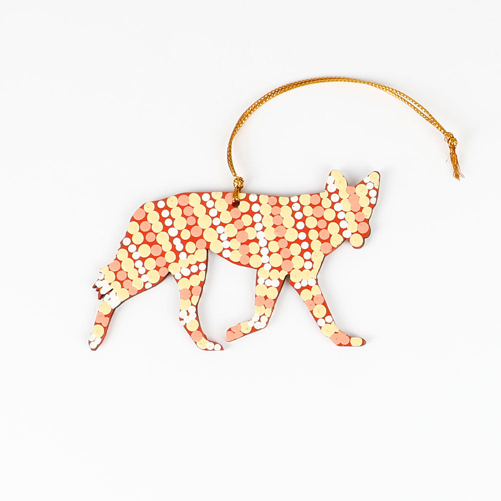 Handpainted desert dog ornaments from Warlukurlangu artists cooperative on white background