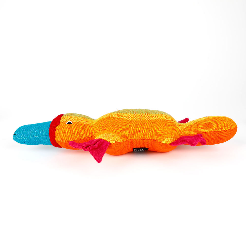 Colorful yellow striped platypus hand made from handwoven fabric by Barefoot Toys on a white background