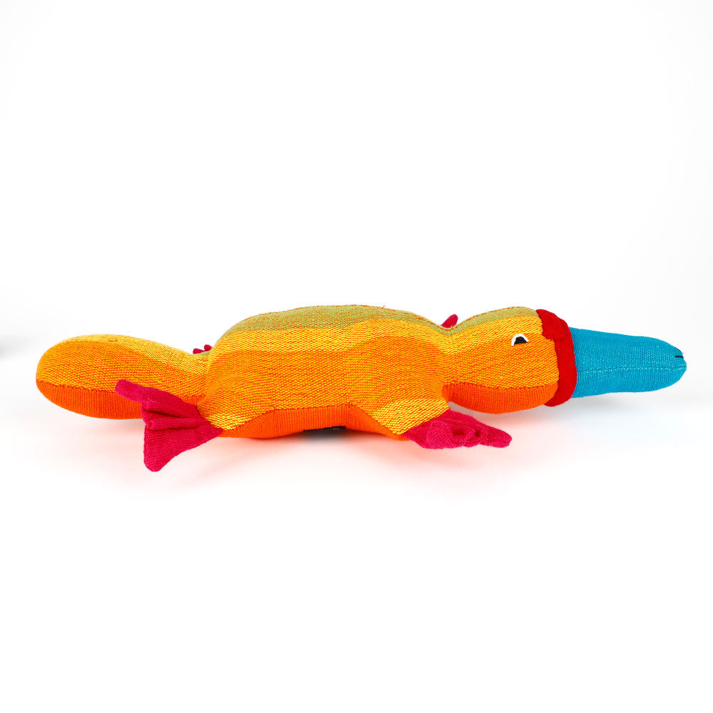 Colorful yellow striped platypus hand made from handwoven fabric by Barefoot Toys on a white background