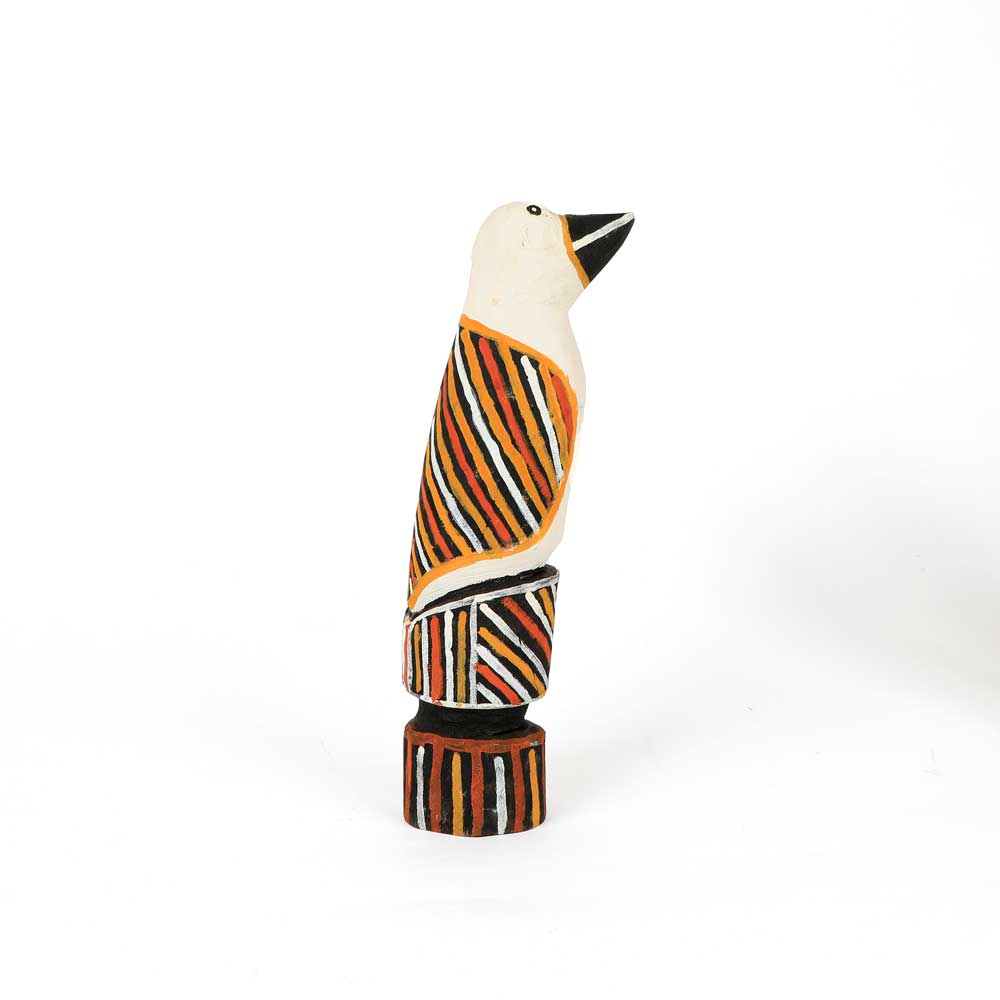 Cream and coloured detail Bird, hand carved and painted in the Tiwi style by Albertus Tipiloura