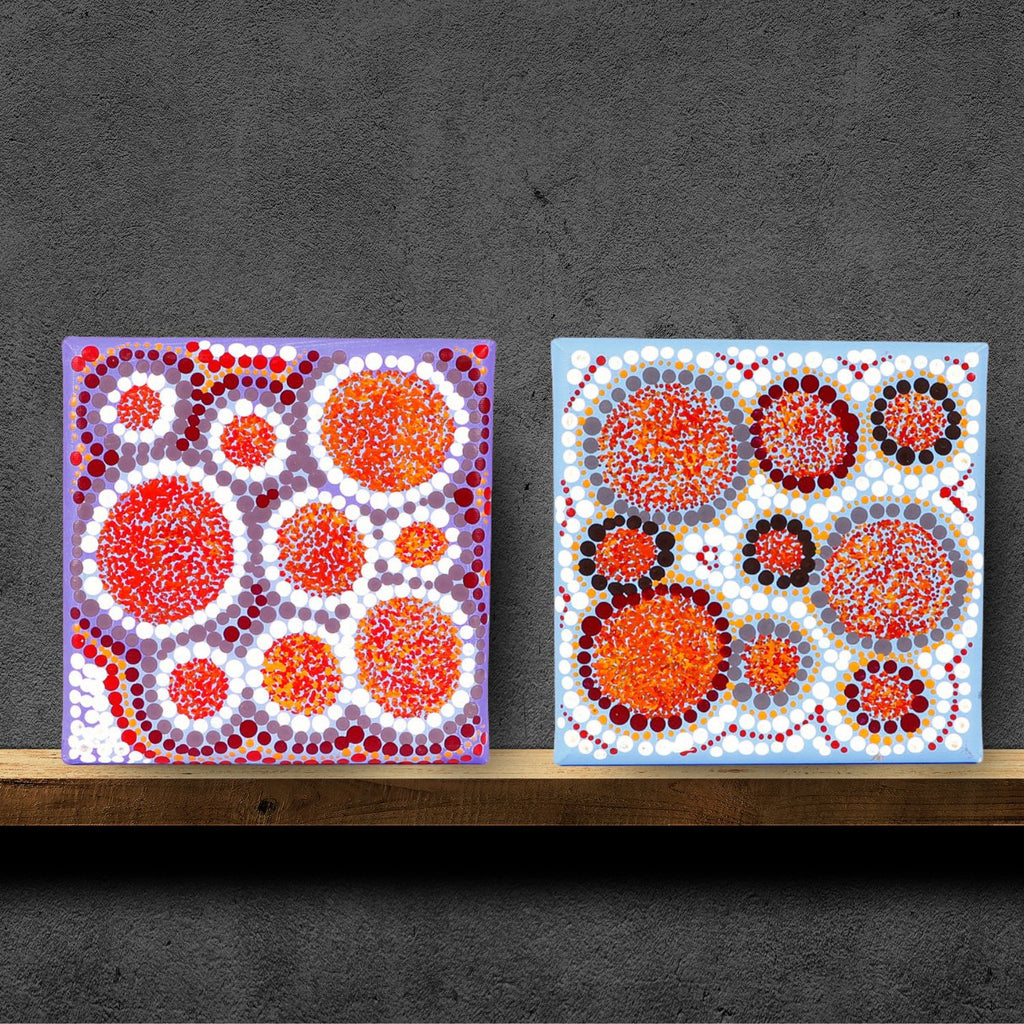 Warlukurlangu Art Canvas | Original Aboriginal artwork on shelf against a dark wall background