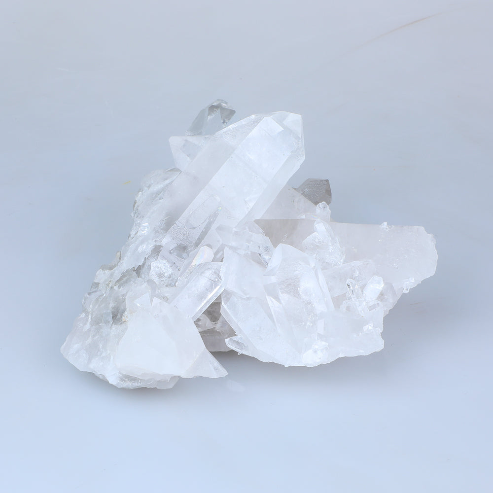 Quartz specimen. Clear quartz cluster photographed against white background. Australian Museum shop online