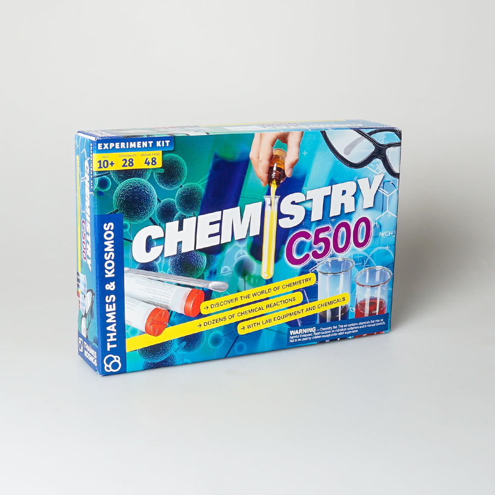 Chemistry set, 28 chemical experiments. Science kit photographed against white