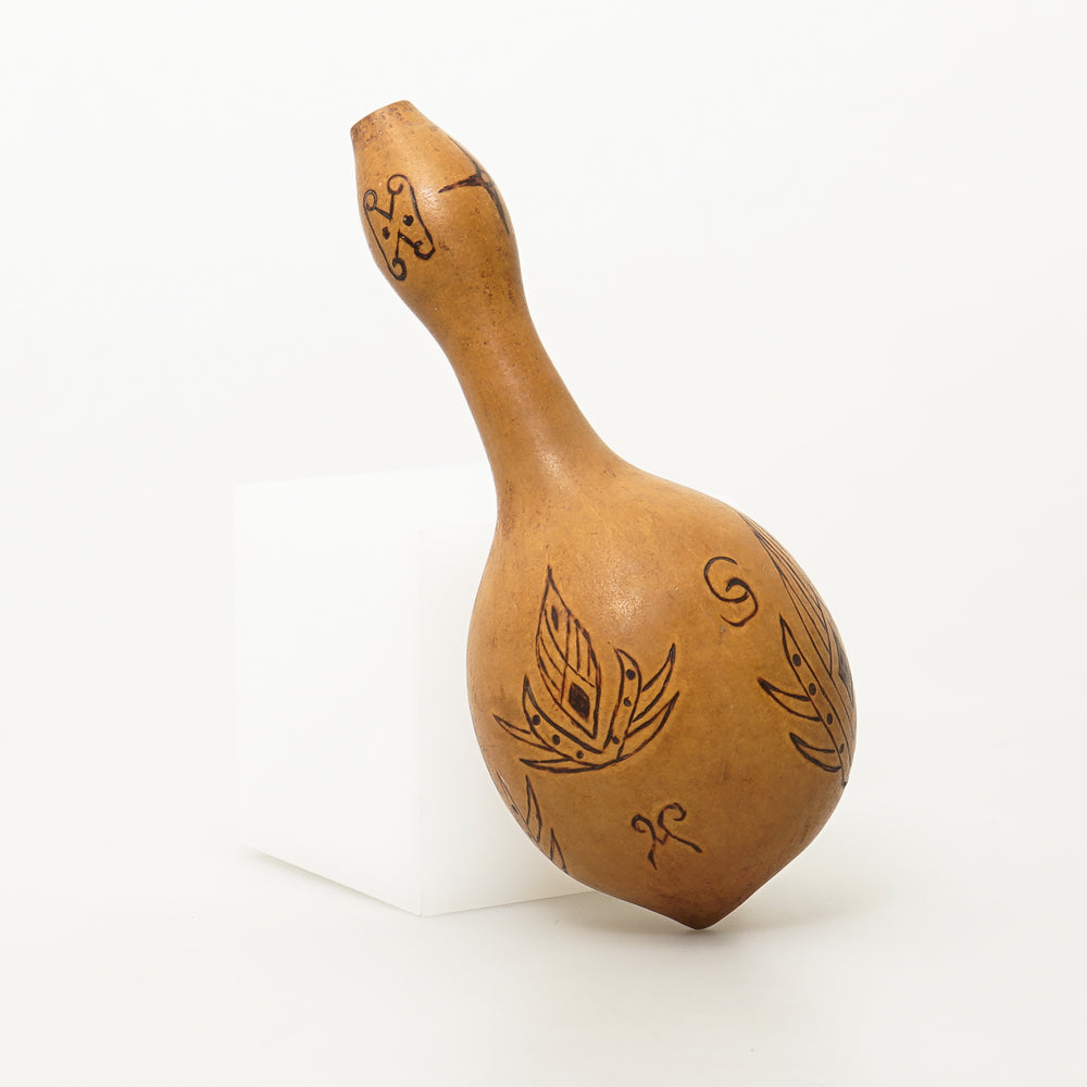 Authentic, hand carved lime gourd produced by an artist who lives and works within Papua New Guinea's Sepik River region