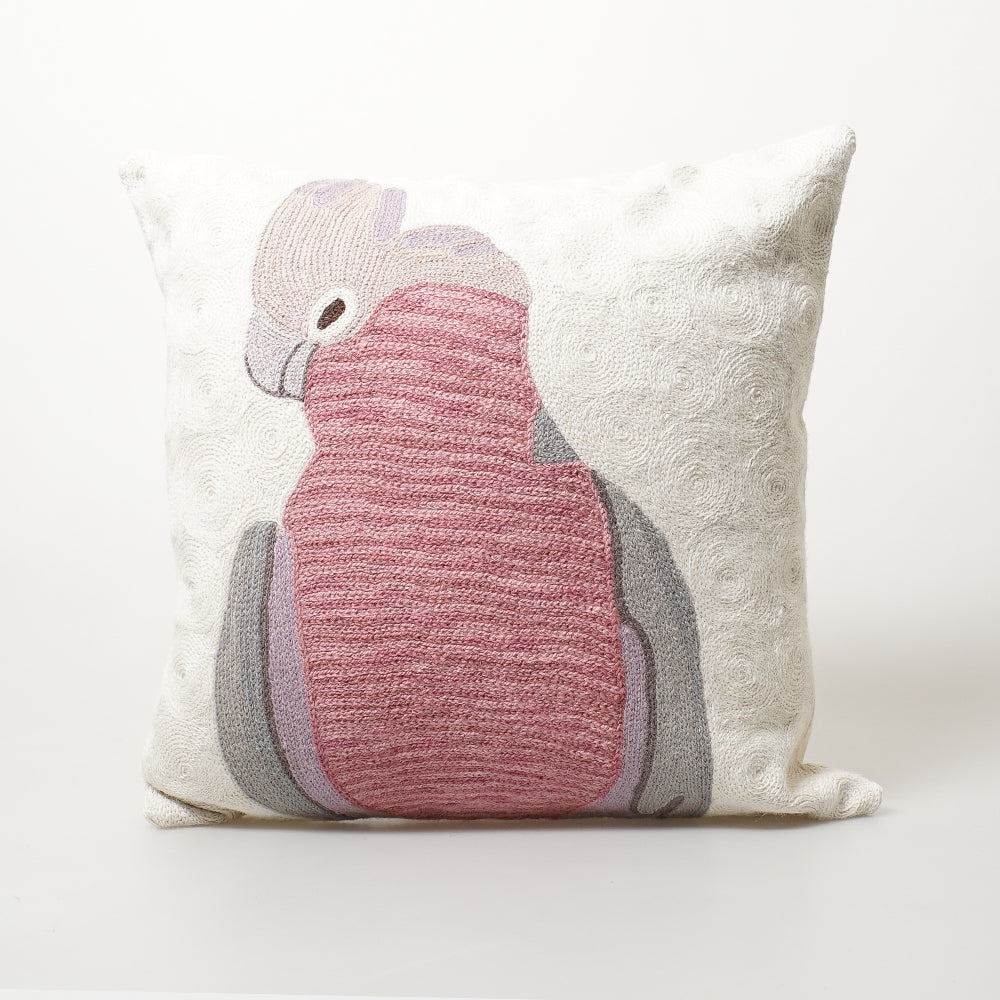 Embroidered galah cushion photographed on white background for the Australian Museum Shop online