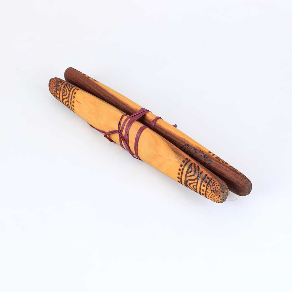 clapsticks hand carved and marked by Wailwaan and yuin maker, songman and educator, Millmillian