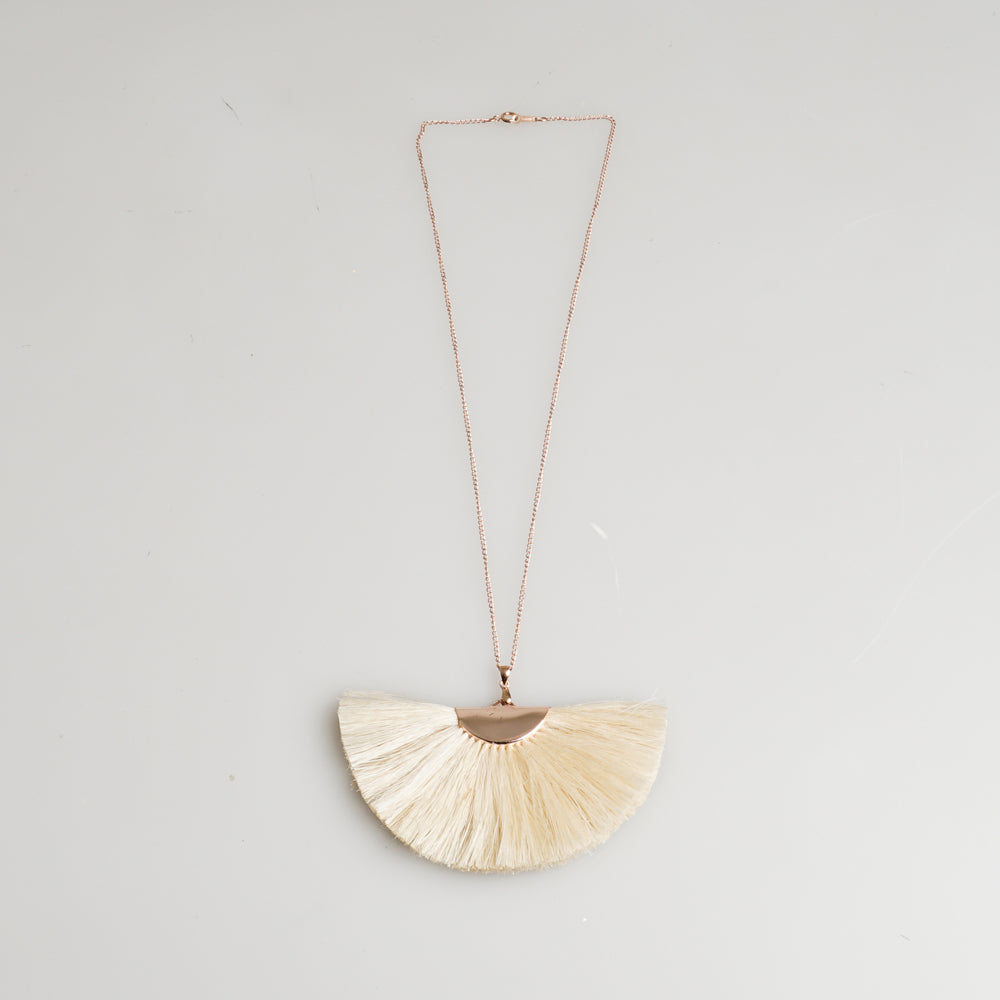 18k rose gold filled chain necklace, with a plated metal pendant and natural bilum fibre detail.