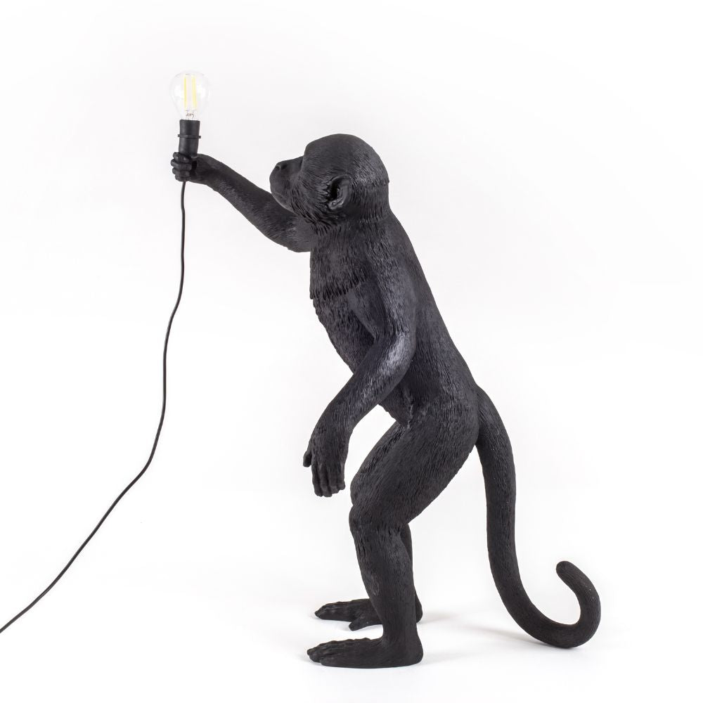 Monkey light. Black resin cast monkey model holds LED light. Australian Museum Shop Online