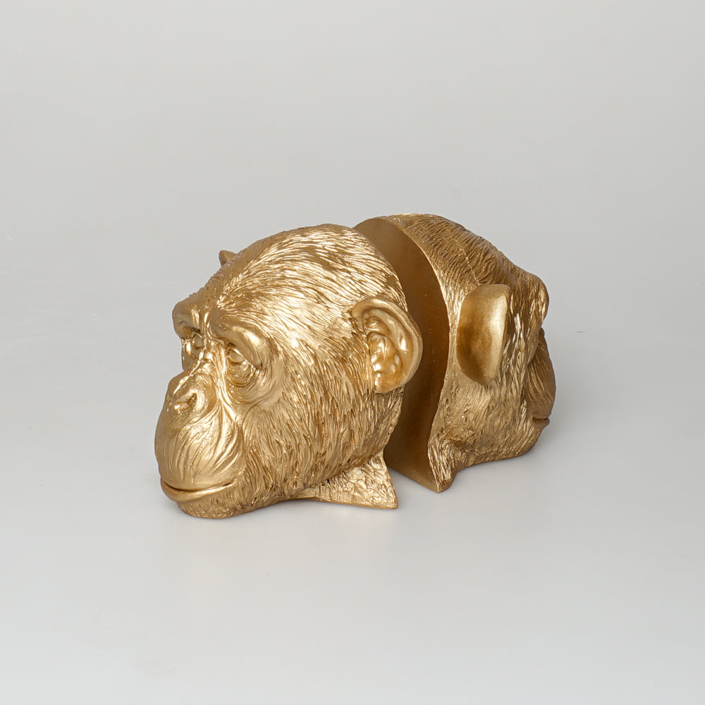 Monkey head bookends, cast resin, gold painted Australian Museum Shop online
