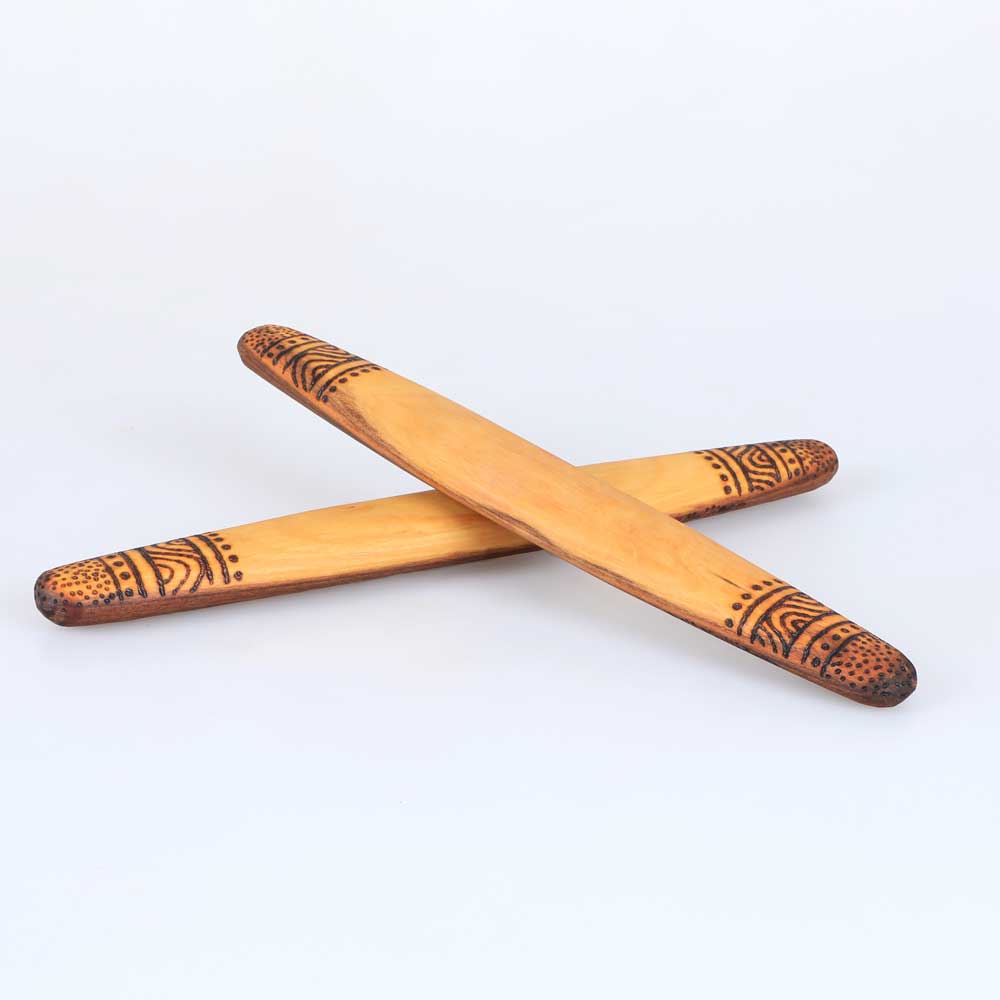 clapsticks hand carved and marked by Wailwaan and yuin maker, songman and educator, Millmillian